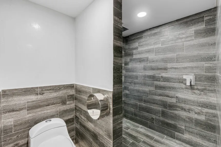 Shared bathroom with walk-in shower