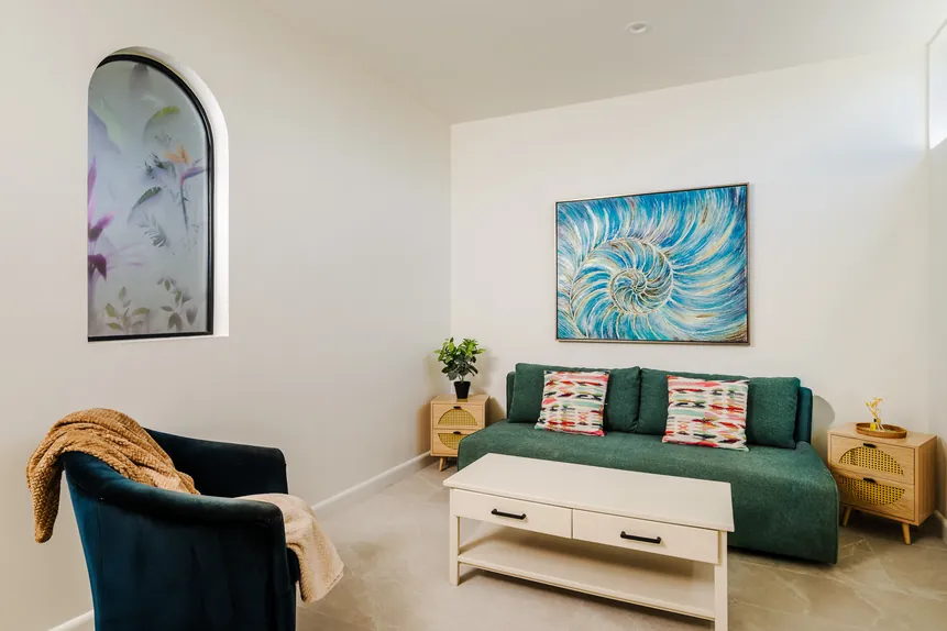 Signature Suite lounge with queen futon sofa