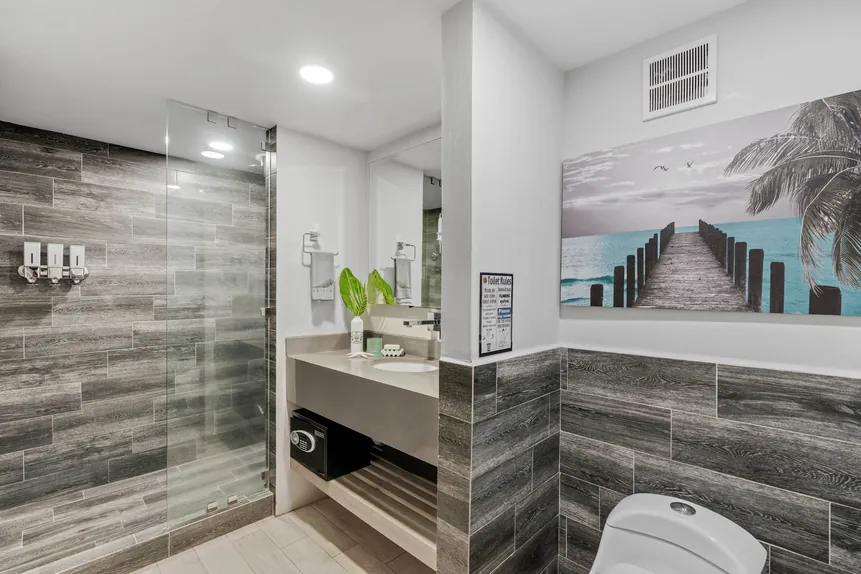 En-suite bathroom with walk-in shower in the Surf Loft Suite