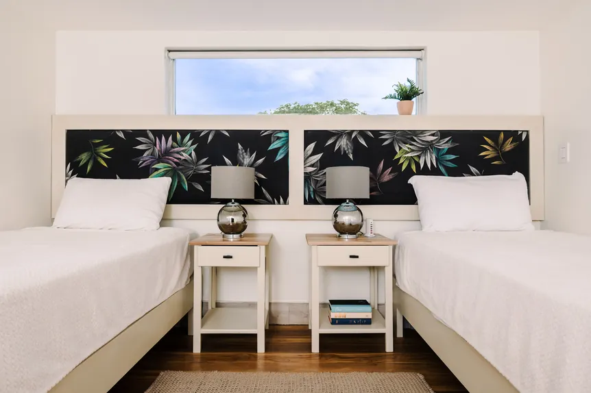 Two twin beds in the Surf Loft Suite